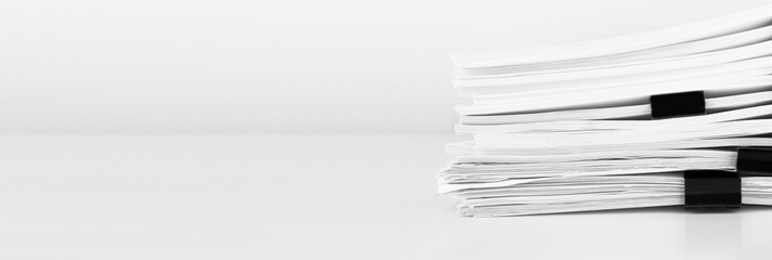 Stack of report paper documents for business desk, Business papers for Annual Reports files....