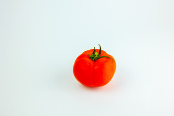 Single Juicy tomato Isolated on white background