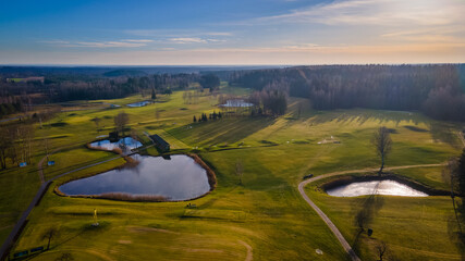 Fototapeta premium Aerial view of European centre golf course by drone