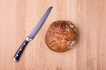 Round loaf of freshly backed sourdough bread