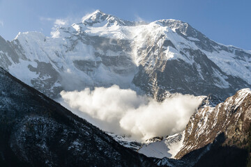 Snow avalanche on Annapurna II mountain slope, Annapurna Circuit, Nepal © JossK