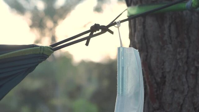Close up of face mask in thr woods.