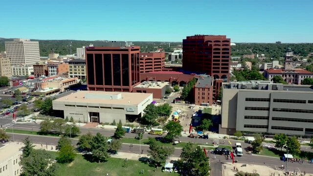 Drone aerial view of downtown Colorado Springs, CO rising up to reveal skyline facing east