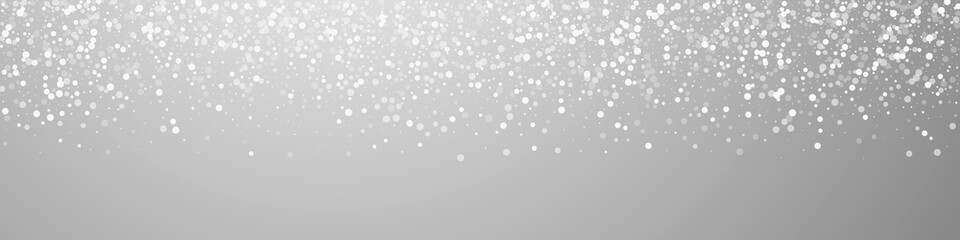 Random white dots Christmas background. Subtle flying snow flakes and stars on grey background. Brilliant winter silver snowflake overlay template. Fetching panoramic illustration.