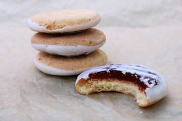 Close-up shot of a tower stacked cookie and a bitten cookie