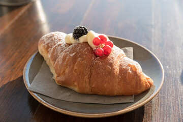 Creamy croissant with berries
