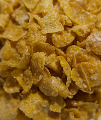 Full frame background close up image of golden sugary breakfast cereal