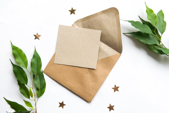 Brown grey develope with white card with space for text. Postcard, greeting or invitation card.