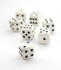 Set of white plastic dices isolated on white