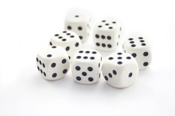 Set of white plastic dices isolated on white