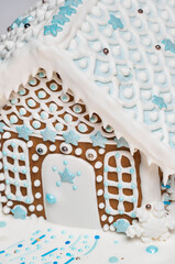 Close up shot of gingerbread house icing details.