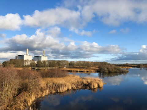 Power station in middle of nature in Burgum, Friesland, Netherlands. Industry versus Nature.