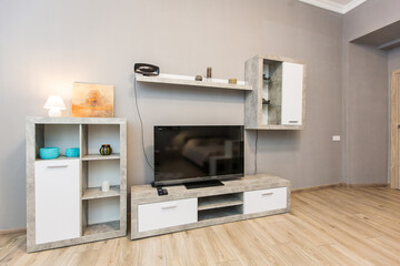 Fototapeta premium interior photography, large living room with bed, in a modern style, in beige light colors