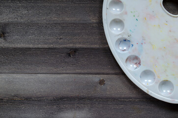 Acrylic paints on the table. Photo of art materials