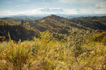 landscape with clouds in Tuscany, Italy in autumn