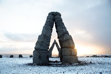 Panorama winter view of monument arches basalt blocks art stone construction Arctic Henge in...