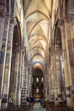 the nave, columns and vault of the romanesque St Julien basilica in Brioude, Auvergne (France)
