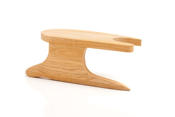 Small wooden tailor ironing board for steam ironing of suit details and sleeves isolated on white background