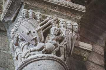 Inside the St Julien Basilica in Brioude, Auvergne (France). Details of a carved capital