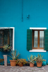 Colorful facade, wall in Burano island in Venice. Beautiful European historic architecture