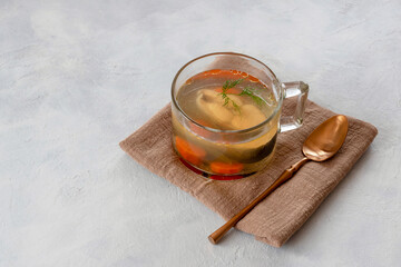 Trout fish soup. Clear broth.