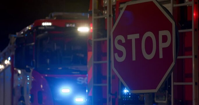 Fire truck flashing lights at night firefighter first aid paramedic rescue team