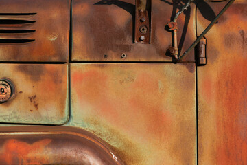The cab of the truck close-up. A rusty sheet of metal. Background of old rusty metal - 404163222
