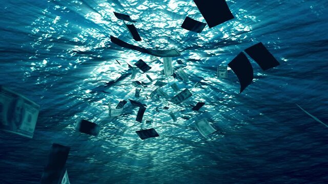 A lot of money, dollars, sinking under the water of the sea.
