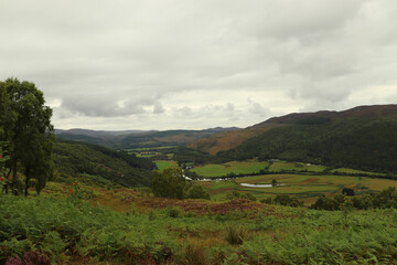 A view down from the hills of Scotland to the glens, rivers and lochs below