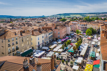 View over the town of Issoire (Auvergne, France), the market square and the surrounding hills from the belvedere of the clock tower, a 15th century belfry 