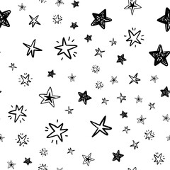 hand drawn stars seamless pattern. Doodle star texture. Sky and night background.