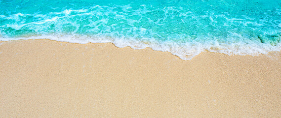 Fototapeta na wymiar Summer sandy beach Background / wave, sea and sand for free space for you to put text..