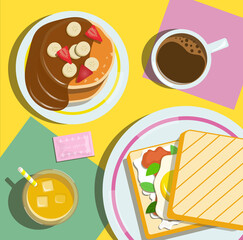 Breakfast serving sandwich coffee pancakes juice top view