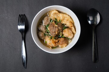 Cuanki is one of the typical snacks of Bandung, West Java, which is a meatball complete with tofu and noodles. Usually Cuanki is sold by traveling merchants by carried 