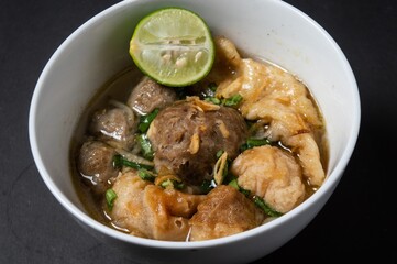 Cuanki is one of the typical snacks of Bandung, West Java, which is a meatball complete with tofu and noodles. Usually Cuanki is sold by traveling merchants by carried 