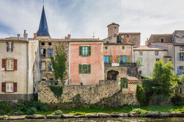 Fototapeta na wymiar Houses on the riverbanks in the small town of Champeix, Auvergne (France)