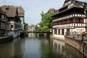 Fototapeta na wymiar Medieval buildings and the canal with swing bridge, Petite France, Strasbourg, France