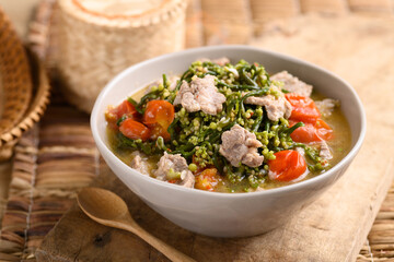 Northern Thai food (Kaeng Puk Plung), Ceylon spinach or Malabar spinach soup with pork in a bowl