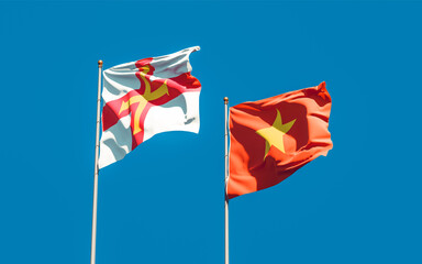 Flags of Guernsey and Vietnam.