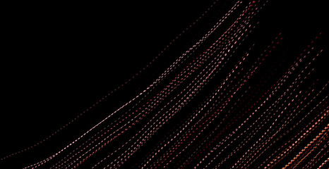 red dotted lines of lights on a black background