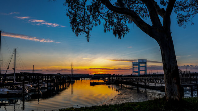 View of a beautiful sunset in the background of Mare Island seen from the Vallejo, Ca. marina 