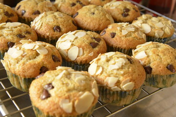 Tasty homemade banana cup cake with almond slice and choc chip.
