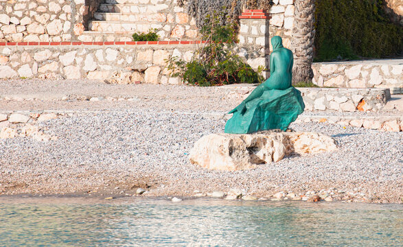TASUCU, TURKEY - JAN. 08, 2021: The depicting a mermaid is a bronze statue by TANKUT OKTEM 