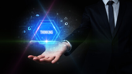 Man hand holding THINKING inscription, social media concept
