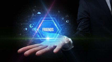 Man hand holding FRIENDS inscription, social media concept