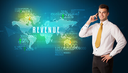 Businessman in front of a decision with REVENUE inscription, business concept