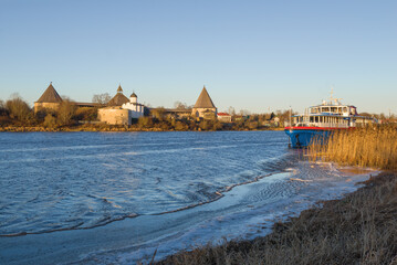 Sunny snowless morning on the Volkhov river. Staraya Ladoga, Russia