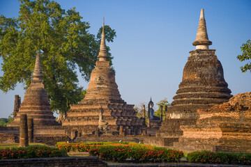 Fototapeta premium Ancient stupas of Sukhothai on a sunny morning. Thailand