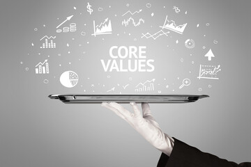 Waiter serving business idea concept with CORE VALUES inscription