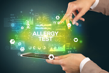 Close-up of a touchscreen with ALLERGY TEST inscription, medical concept
